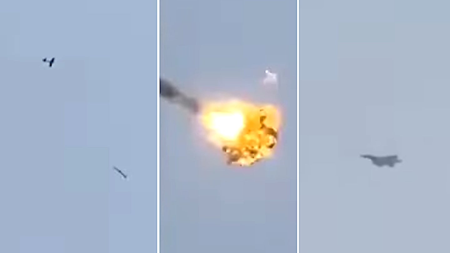 看沙特f - 15战斗机俯冲在低爆炸一个胡塞叛军无人机的天空